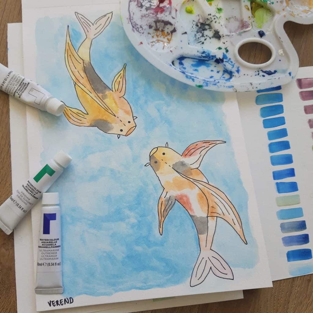 watercolor painting of two yellow fish